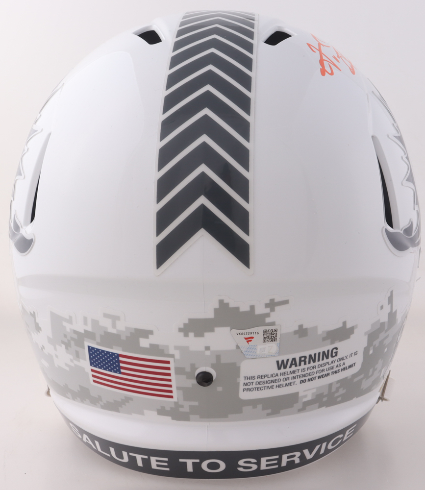Tua Tagovailoa Signed Dolphins Full-Size Salute to Service Alternate Speed Helmet (Fanatics) at PristineAuction.com Tua Tagovailoa Signed Dolphins Full-Size Salute to Service Alternate Speed Helmet (Fanatics) at PristineAuction.com
