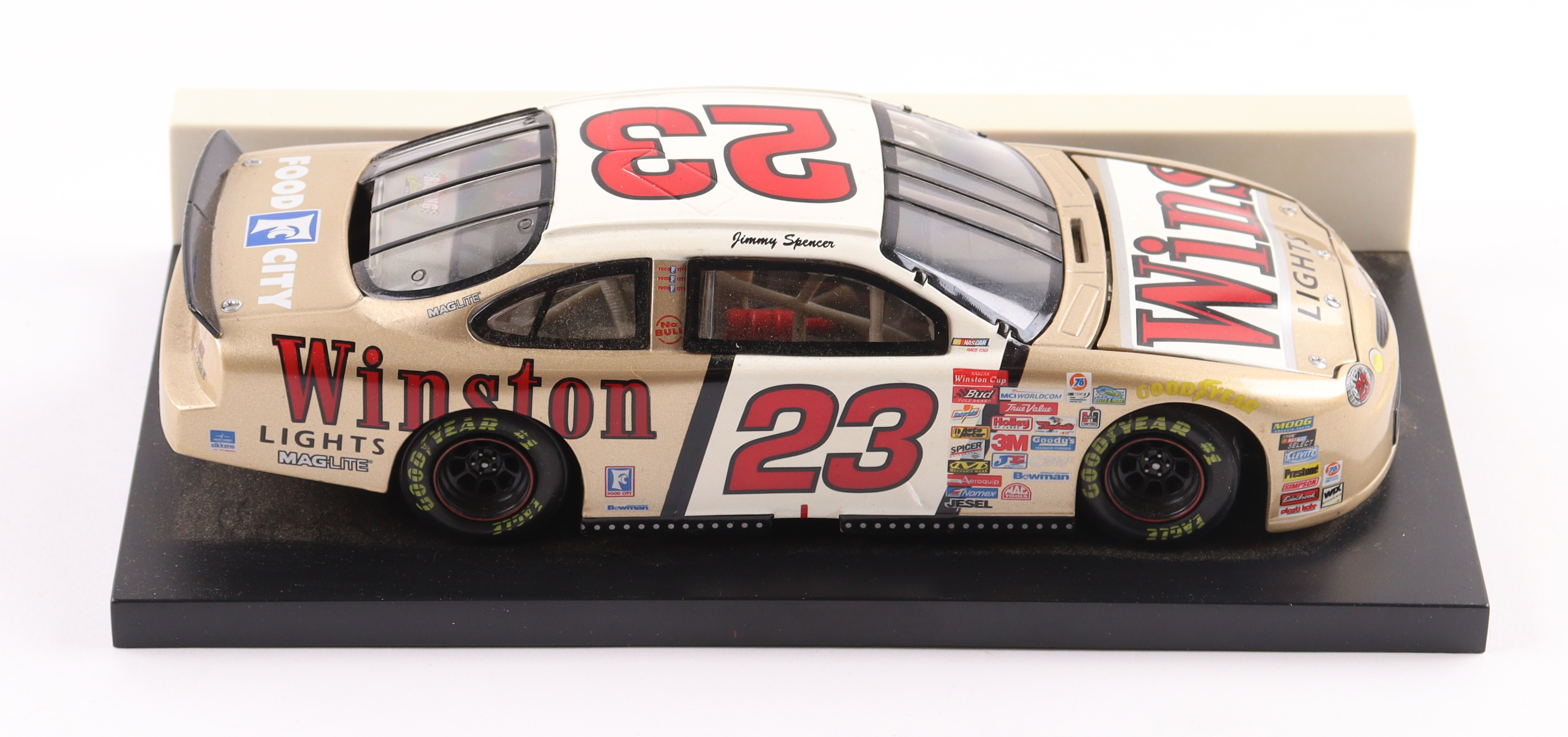 Jimmy Spencer 1999 LE NASCAR #23 Gold Winston Taurus 1:24 Die-Cast Car at PristineAuction.com Jimmy Spencer 1999 LE NASCAR #23 Gold Winston Taurus 1:24 Die-Cast Car at PristineAuction.com