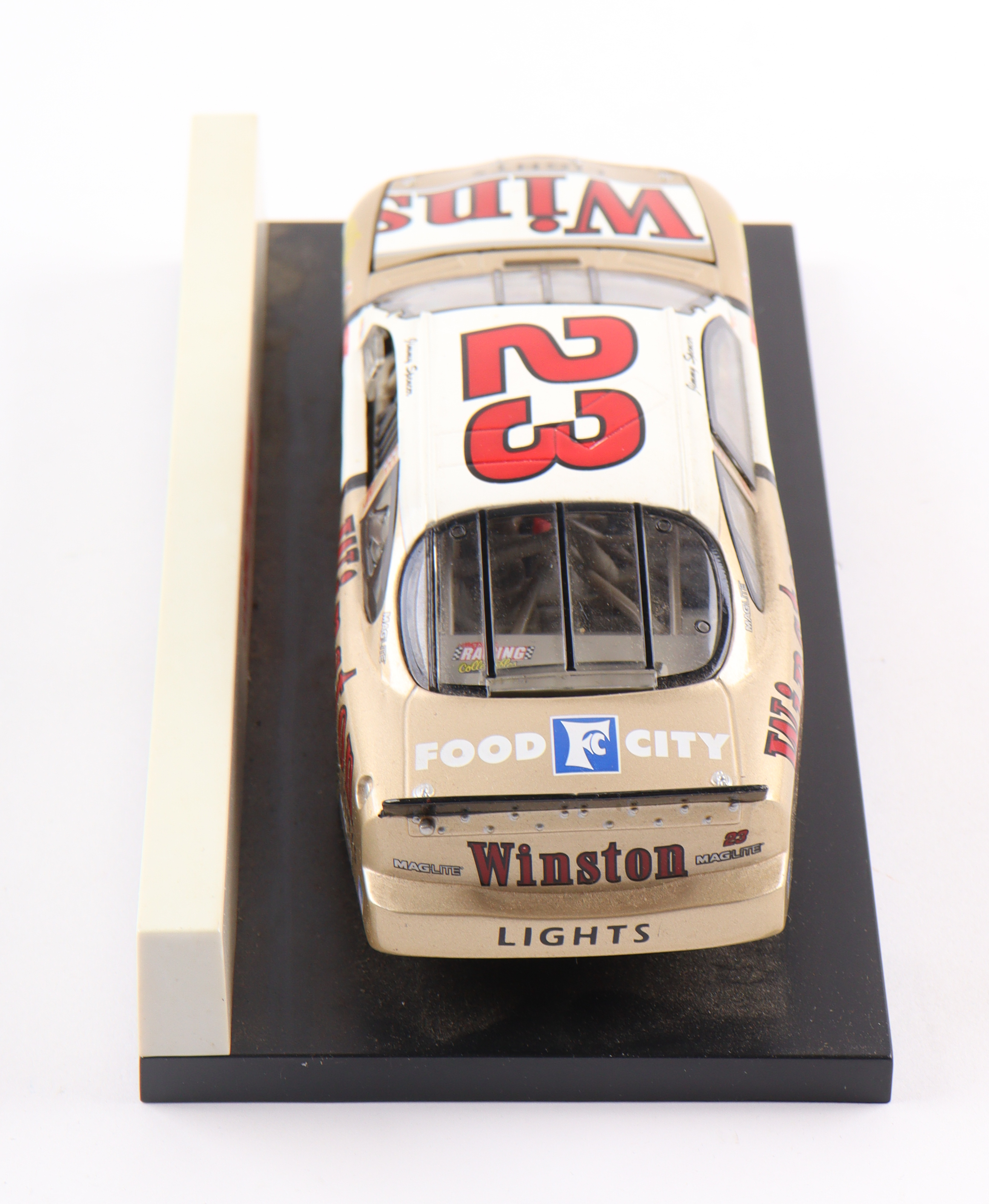 Jimmy Spencer 1999 LE NASCAR #23 Gold Winston Taurus 1:24 Die-Cast Car at PristineAuction.com Jimmy Spencer 1999 LE NASCAR #23 Gold Winston Taurus 1:24 Die-Cast Car at PristineAuction.com