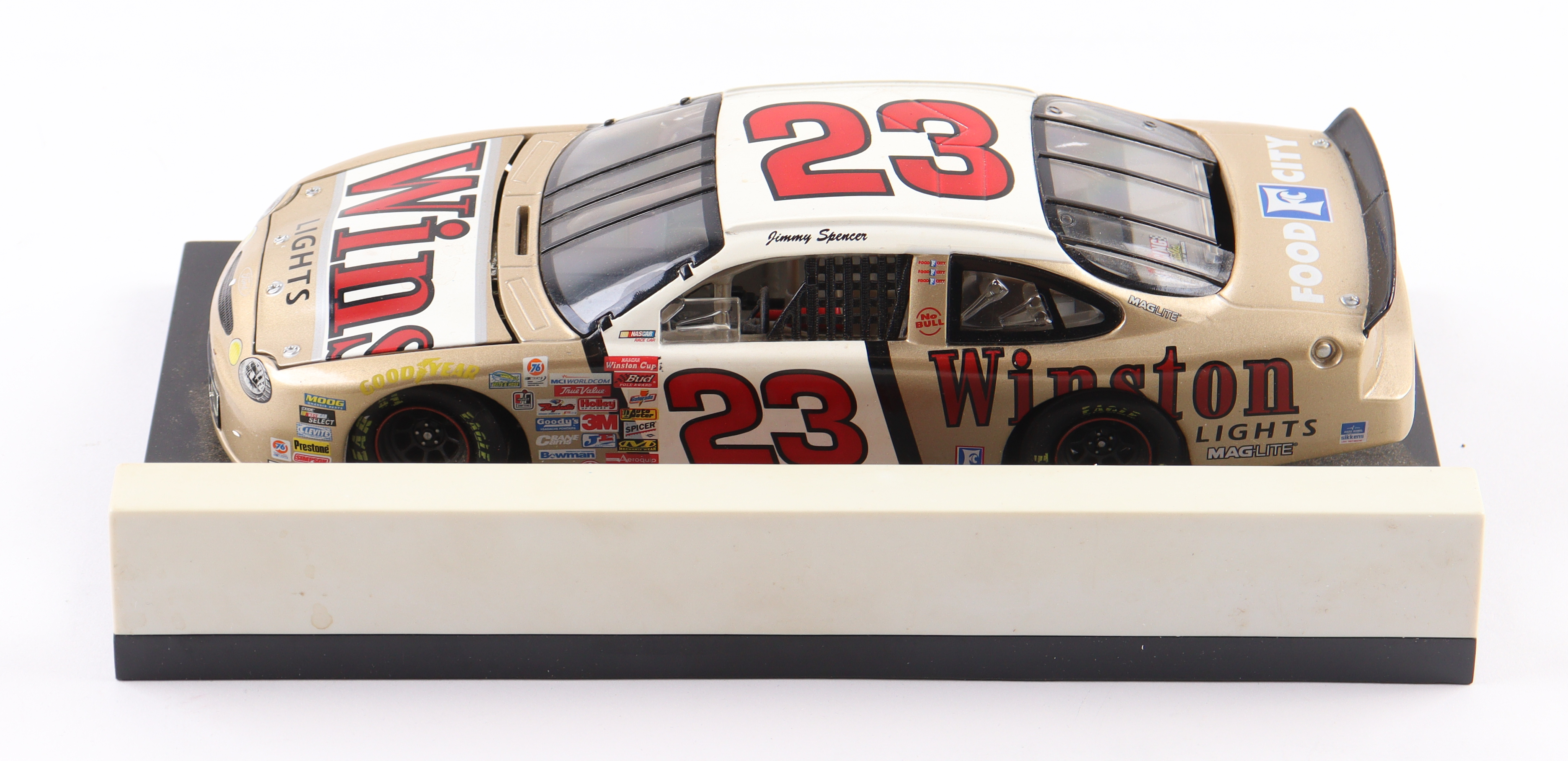 Jimmy Spencer 1999 LE NASCAR #23 Gold Winston Taurus 1:24 Die-Cast Car at PristineAuction.com Jimmy Spencer 1999 LE NASCAR #23 Gold Winston Taurus 1:24 Die-Cast Car at PristineAuction.com