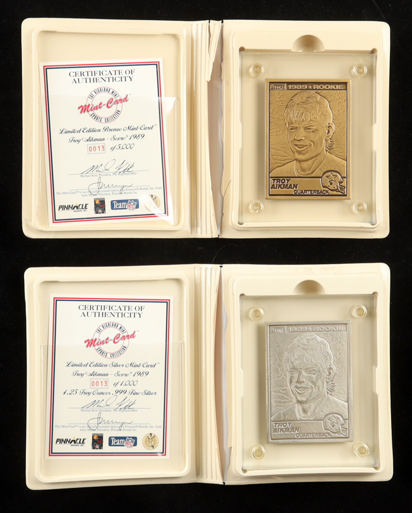 Troy Aikman LE 1995 The Highland Mint '89 Score Set of (2) Silver & Bronze Mint-Cards at PristineAuction.com Troy Aikman LE 1995 The Highland Mint '89 Score Set of (2) Silver & Bronze Mint-Cards at PristineAuction.com