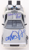 Christopher Lloyd & Michael J. Fox Signed "Back to the Future II" DeLorean Time Machine 1:24 Scale Die-Cast Car (Beckett) at PristineAuction.com