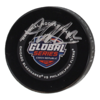 Alex DeBrincat Signed 2019 Global Series Logo Hockey Puck (Fanatics) at PristineAuction.com