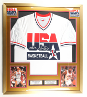 Larry Bird & Magic Johnson Signed Team USA Custom Framed Authentic Mitchell & Ness Warm-Up Shirt Display with Career Stat Plaque (PSA & Beckett) at PristineAuction.com