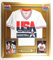 Larry Bird & Magic Johnson Signed Team USA Custom Framed Authentic Mitchell & Ness Warm-Up Shirt Display with (2) Olympic Pins (PSA & Beckett) at PristineAuction.com