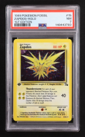 Zapdos 1999 Pokemon Fossil 1st Edition #15 Holo (PSA 7) at PristineAuction.com