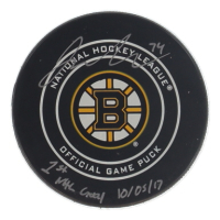 Jake DeBrusk Signed Bruins Logo Hockey Puck Inscribed "1st NHL Goal 10/05/17" (COJO) at PristineAuction.com