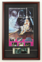"Star Wars: A New Hope" Custom Framed Poster Print Display with 1977 70mm Film Cel at PristineAuction.com