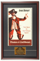 Disney's Disneyland Pirates of the Caribbean Custom Framed Print Display with Crossbones Emblem at PristineAuction.com