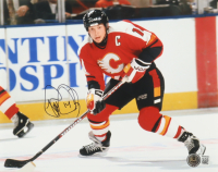 Theo Fleury Signed Flames 8x10 Photo (Beckett) at PristineAuction.com
