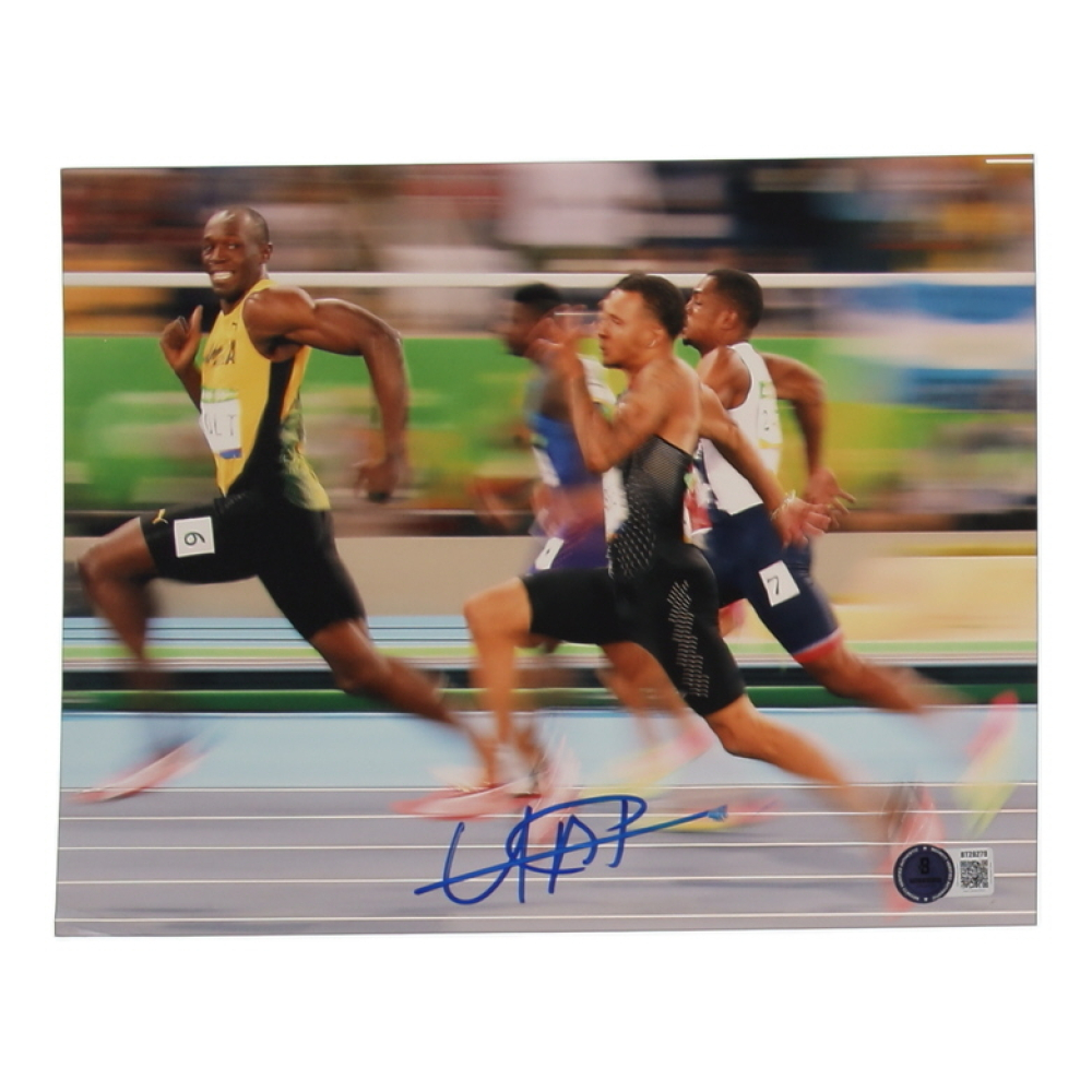 Usain Bolt Signed Team Jamaica 8x10 Photo (Beckett) at PristineAuction.com