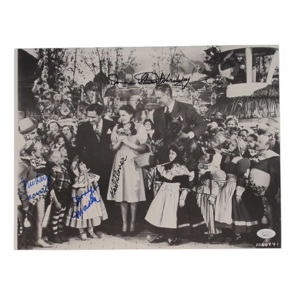 "The Wizard of Oz" 11x14.5 Photo Cast-Signed By (4) with Mickey Carroll, Jerry Maren, Karl Slover & Donna Stewart Hardway (JSA) at PristineAuction.com