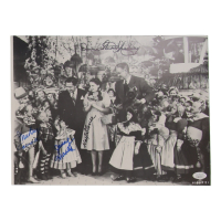 "The Wizard of Oz" 11x14.5 Photo Cast-Signed By (4) with Mickey Carroll, Jerry Maren, Karl Slover & Donna Stewart Hardway (JSA) at PristineAuction.com