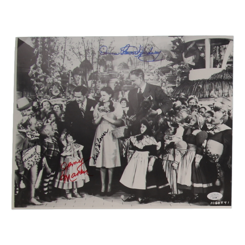 "The Wizard of Oz" 11x14.5 Photo Cast-Signed By (4) with Mickey Carroll, Jerry Maren, Karl Slover & Donna Stewart Hardway (JSA) at PristineAuction.com