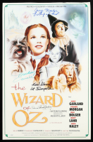 "The Wizard of Oz" 15x24 Movie Poster Photo Signed By (4) with Mickey Carroll, Jerry Maren, Karl Slover, and Donna Stewart-Hardway With Character Inscriptions (JSA) at PristineAuction.com