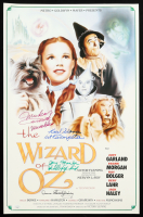 "The Wizard of Oz" 15x24 Movie Poster Photo Signed By (4) with Mickey Carroll, Jerry Maren, Karl Slover, and Donna Stewart-Hardway With Character Inscriptions (JSA) at PristineAuction.com