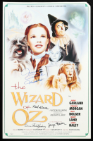 "The Wizard of Oz" 15x24 Movie Poster Photo Signed By (4) with Mickey Carroll, Jerry Maren, Karl Slover, and Donna Stewart-Hardway With Character Inscriptions (JSA) at PristineAuction.com