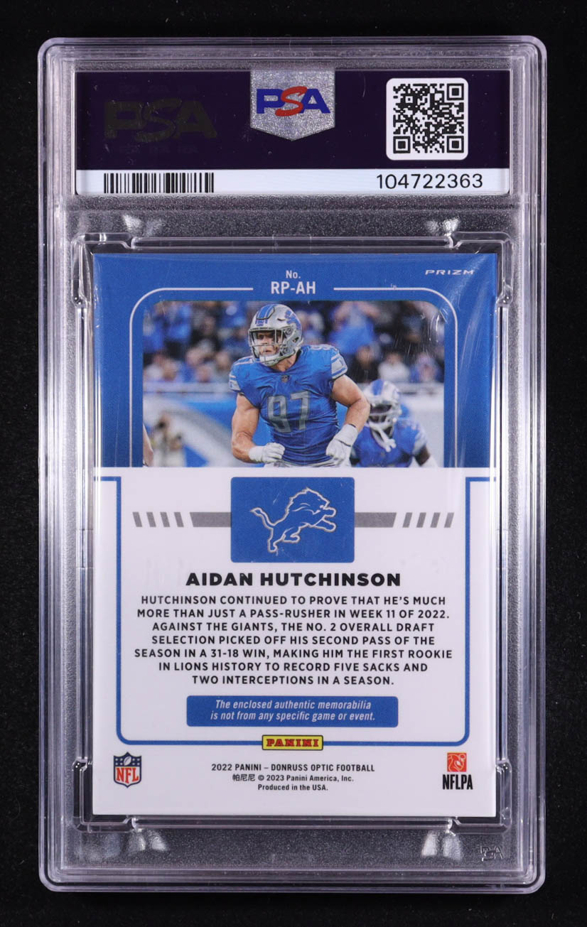 Aidan Hutchinson 2022 Donruss Optic Rookie Phenoms Jerseys Blue Hyper #13 RC (PSA 9) at PristineAuction.com Aidan Hutchinson 2022 Donruss Optic Rookie Phenoms Jerseys Blue Hyper #13 RC (PSA 9) at PristineAuction.com