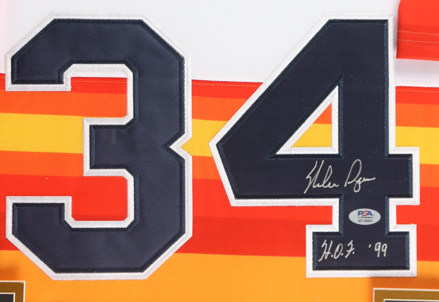Nolan Ryan Signed Custom Framed Jersey Display Inscribed "HOF 99" with (5) Nolan Ryan Pins (PSA) at PristineAuction.com Nolan Ryan Signed Custom Framed Jersey Display Inscribed "HOF 99" with (5) Nolan Ryan Pins (PSA) at PristineAuction.com