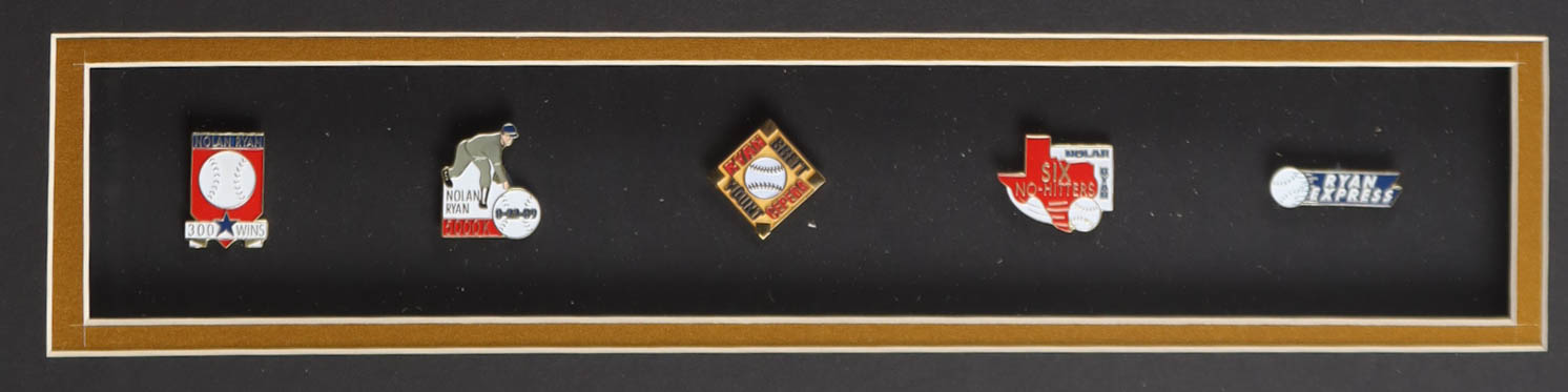 Nolan Ryan Signed Custom Framed Jersey Display Inscribed "HOF 99" with (5) Nolan Ryan Pins (PSA) at PristineAuction.com Nolan Ryan Signed Custom Framed Jersey Display Inscribed "HOF 99" with (5) Nolan Ryan Pins (PSA) at PristineAuction.com