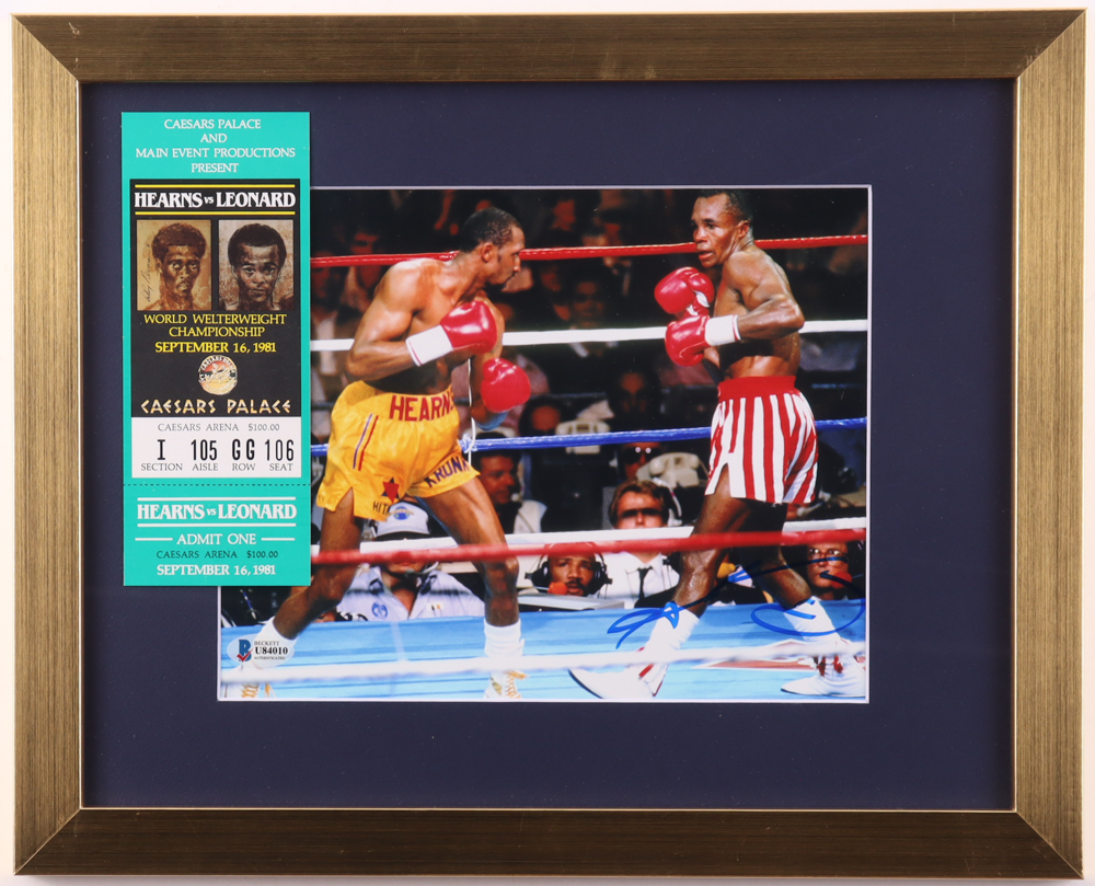 Sugar Ray Leonard Signed Hearns vs. Leonard Custom Framed Fight Photo (Beckett) at PristineAuction.com Sugar Ray Leonard Signed Hearns vs. Leonard Custom Framed Fight Photo (Beckett) at PristineAuction.com