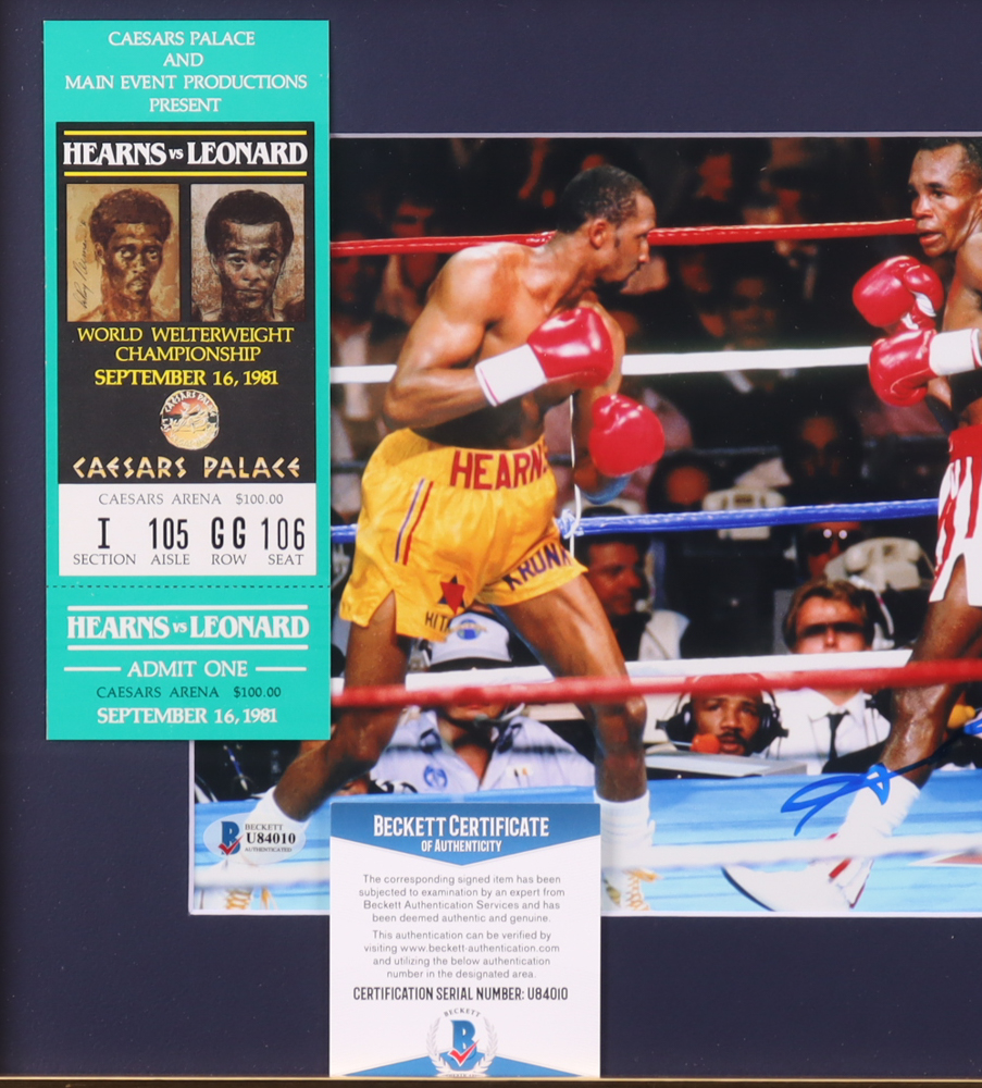 Sugar Ray Leonard Signed Hearns vs. Leonard Custom Framed Fight Photo (Beckett) at PristineAuction.com Sugar Ray Leonard Signed Hearns vs. Leonard Custom Framed Fight Photo (Beckett) at PristineAuction.com