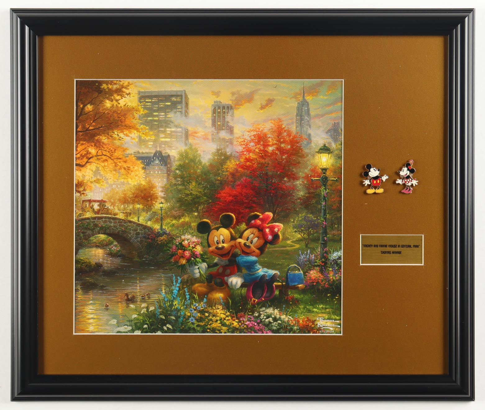 "Mickey and Minnie Mouse in Central Park" by Thomas Kinkade Custom Framed Display at PristineAuction.com "Mickey and Minnie Mouse in Central Park" by Thomas Kinkade Custom Framed Display at PristineAuction.com