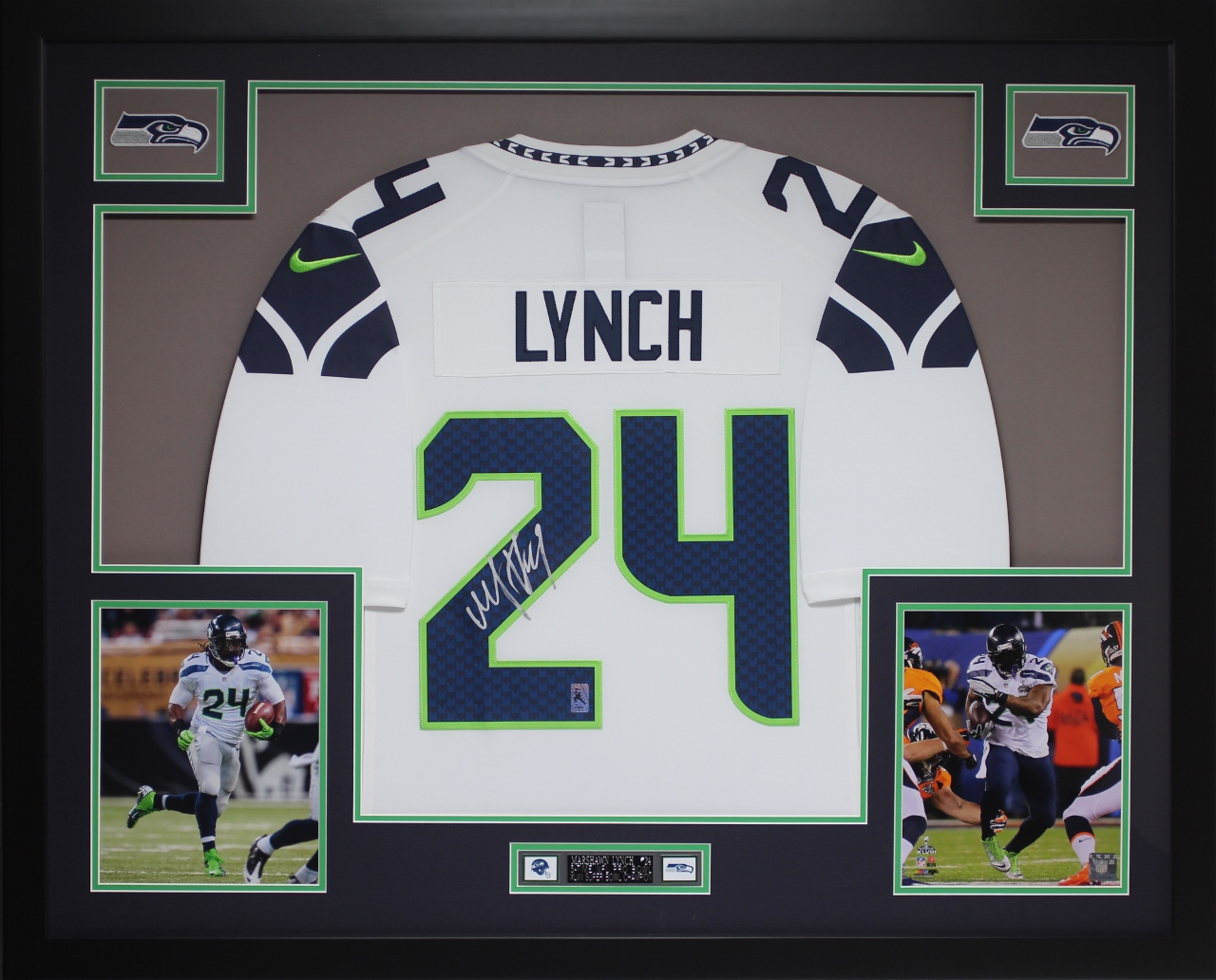 Marshawn Lynch Signed Seattle Seahawks 35x43 Custom Framed Jersey (Lynch Hologram) at PristineAuction.com Marshawn Lynch Signed Seattle Seahawks 35x43 Custom Framed Jersey (Lynch Hologram) at PristineAuction.com