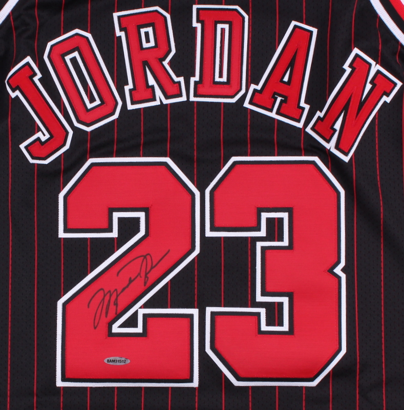 Michael Jordan Signed Bulls Authentic Mitchell & Ness Pinstripe Alternate Jersey (UDA COA) at PristineAuction.com Michael Jordan Signed Bulls Authentic Mitchell & Ness Pinstripe Alternate Jersey (UDA COA) at PristineAuction.com