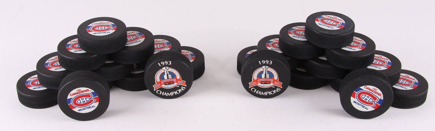 Lot of (24) Canadiens NHL Logo Hockey Pucks with 1993 Stanley Cup Champions & Team Logo Pucks at PristineAuction.com Lot of (24) Canadiens NHL Logo Hockey Pucks with 1993 Stanley Cup Champions & Team Logo Pucks at PristineAuction.com