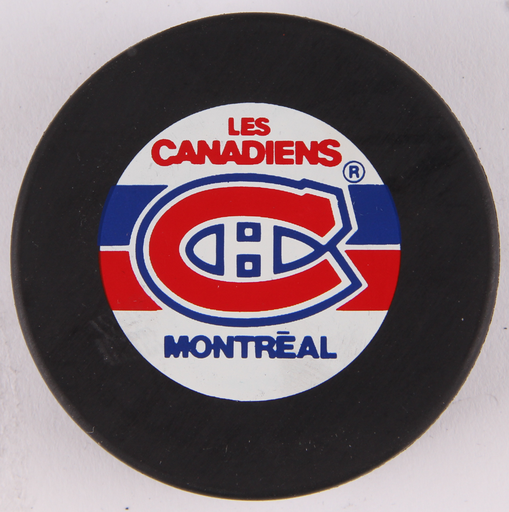 Lot of (24) Canadiens NHL Logo Hockey Pucks with 1993 Stanley Cup Champions & Team Logo Pucks at PristineAuction.com Lot of (24) Canadiens NHL Logo Hockey Pucks with 1993 Stanley Cup Champions & Team Logo Pucks at PristineAuction.com