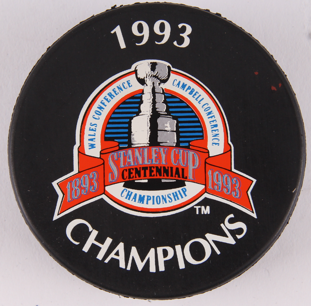 Lot of (24) Canadiens NHL Logo Hockey Pucks with 1993 Stanley Cup Champions & Team Logo Pucks at PristineAuction.com Lot of (24) Canadiens NHL Logo Hockey Pucks with 1993 Stanley Cup Champions & Team Logo Pucks at PristineAuction.com