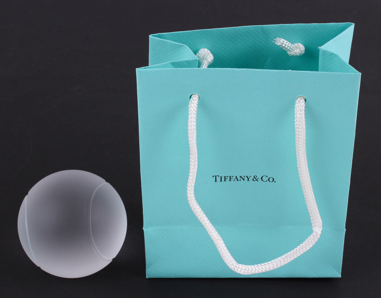Tiffany & Co. Crystal Tennis Ball at PristineAuction.com Tiffany & Co. Crystal Tennis Ball at PristineAuction.com