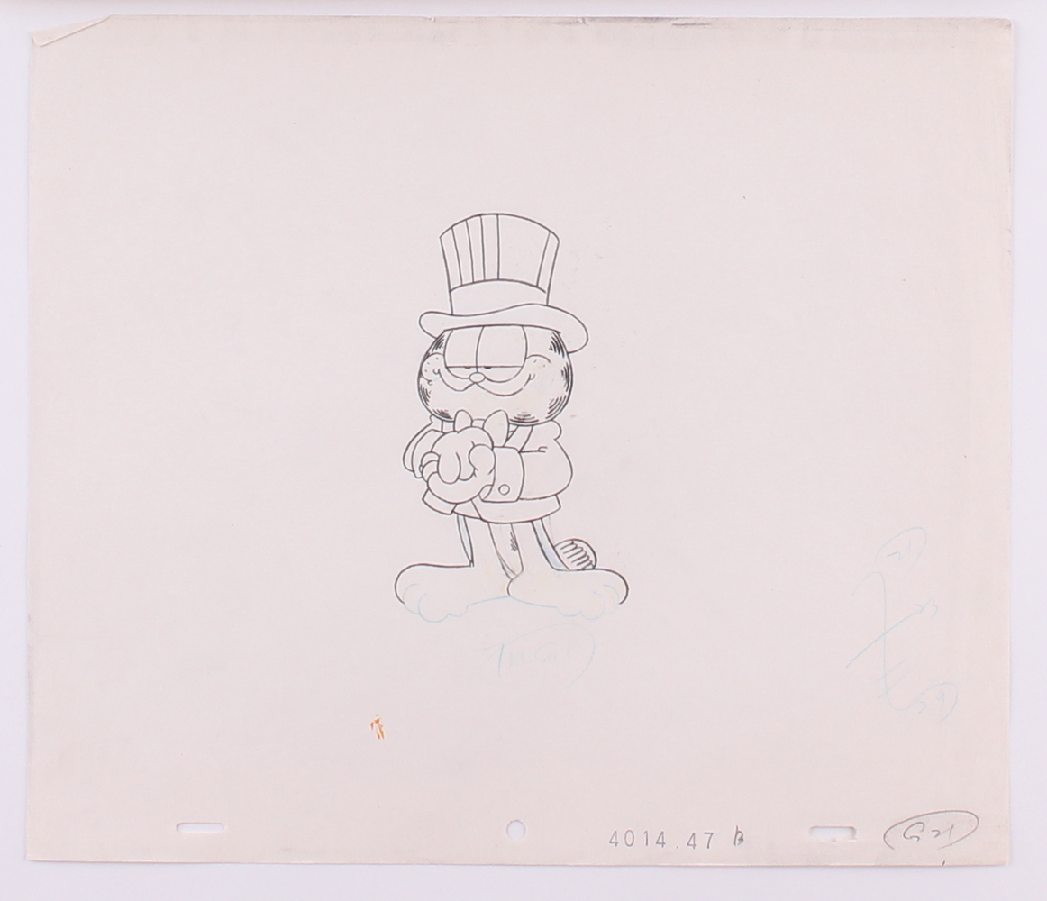 Jim Davis Signed "Garfield Sporting a Top Hat and Tails in Front of the Fireplace" 12.5" x 10.5" Original Hand-Painted Animation Production Cel with Drawing (PA LOA) at PristineAuction.com Jim Davis Signed "Garfield Sporting a Top Hat and Tails in Front of the Fireplace" 12.5" x 10.5" Original Hand-Painted Animation Production Cel with Drawing (PA LOA) at PristineAuction.com