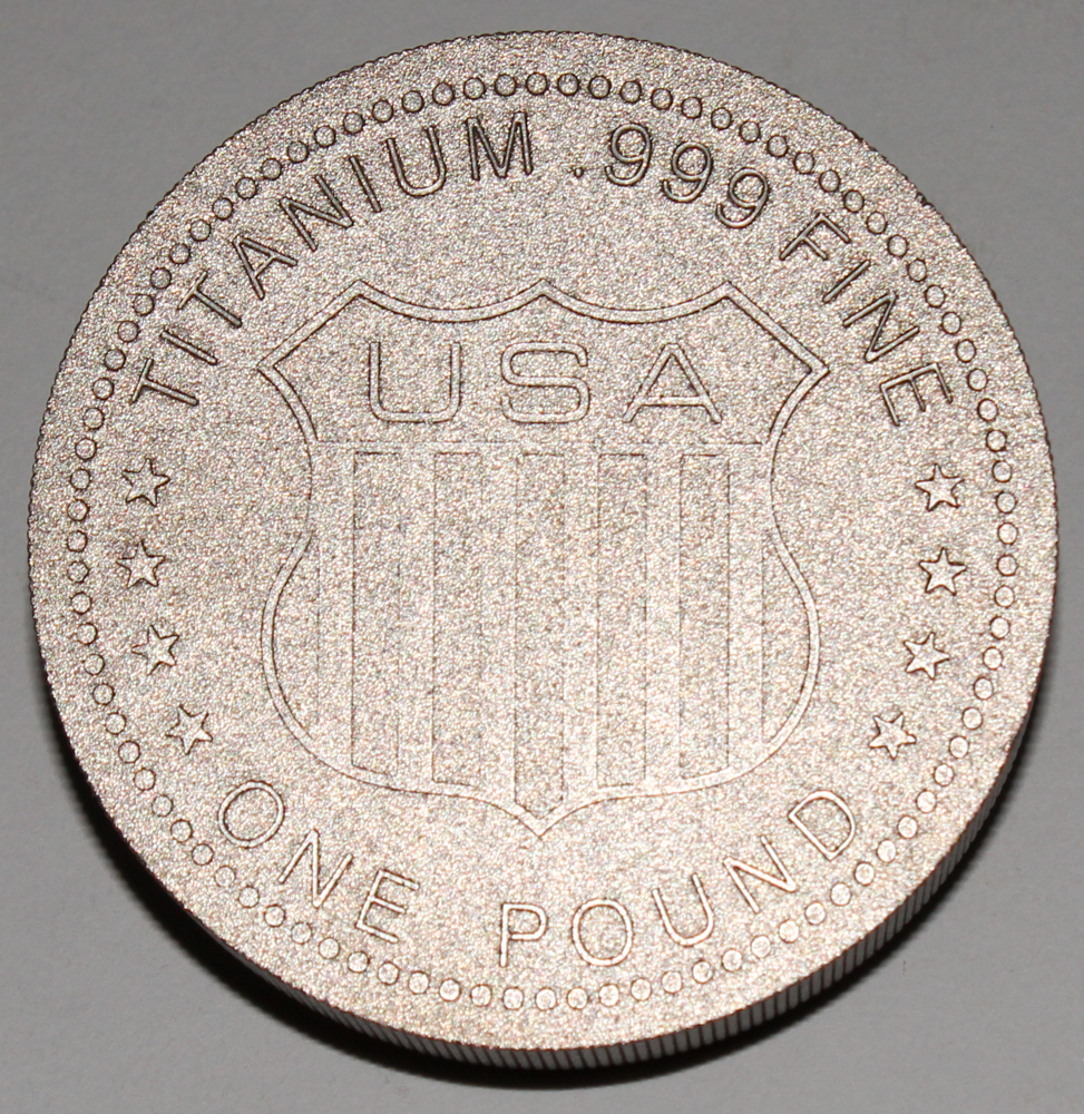 1 Pound (16 oz) Titanium Element Design Round Bullion Bar at PristineAuction.com 1 Pound (16 oz) Titanium Element Design Round Bullion Bar at PristineAuction.com