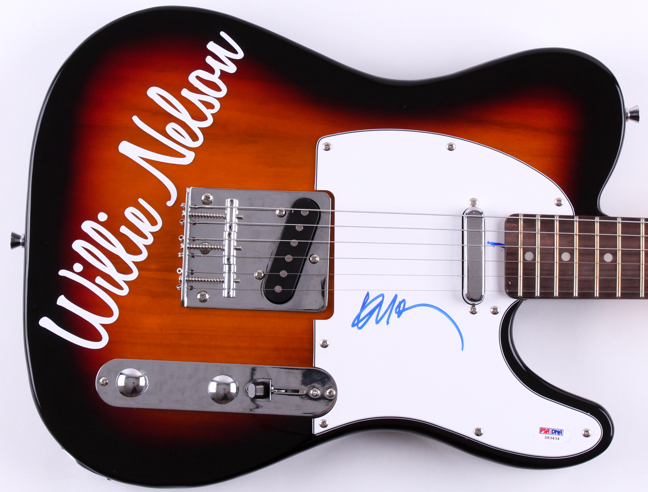 Willie Nelson Signed Full-Size Crescent Electric Guitar (PSA COA) at PristineAuction.com Willie Nelson Signed Full-Size Crescent Electric Guitar (PSA COA) at PristineAuction.com