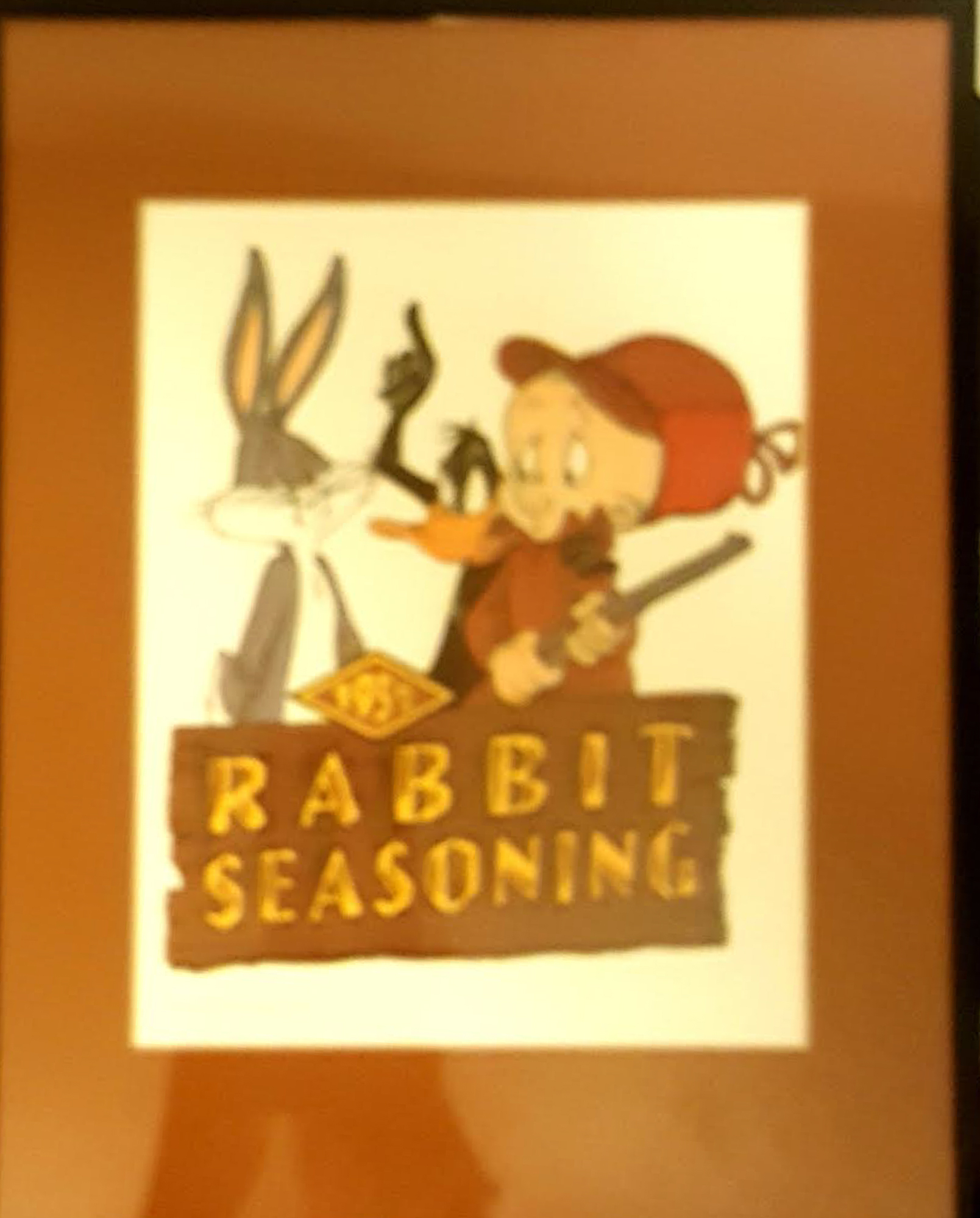 Bugs Bunny, Daffy Duck & Elmer Fudd "Rabbit Seasoning" 1994 Warner Bros 11" x 14" Custom Framed Lithograph (Looney Tunes COA) at PristineAuction.com Bugs Bunny, Daffy Duck & Elmer Fudd "Rabbit Seasoning" 1994 Warner Bros 11" x 14" Custom Framed Lithograph (Looney Tunes COA) at PristineAuction.com