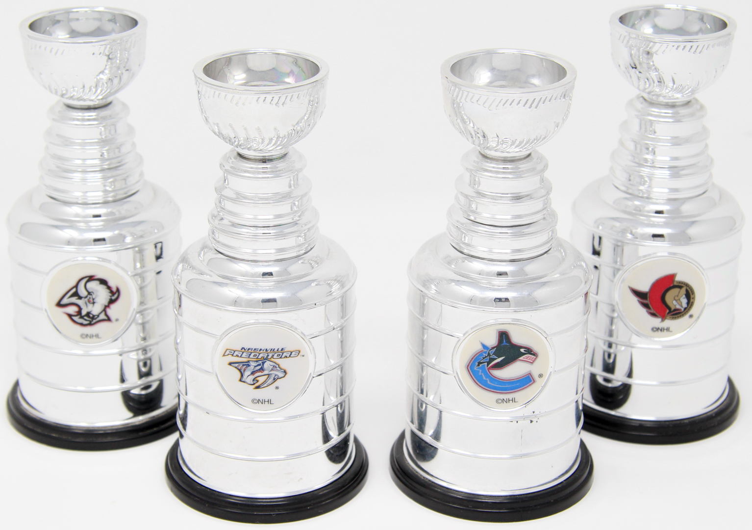 Lot of (4) Labatt's Mini Stanley Cup Replica Trophies at PristineAuction.com Lot of (4) Labatt's Mini Stanley Cup Replica Trophies at PristineAuction.com