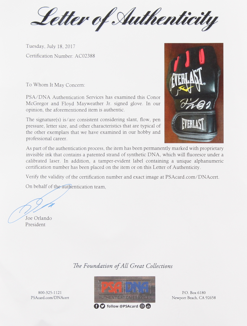 Floyd Mayweather Jr. & Conor McGregor Signed Everlast MMA Glove (PSA LOA) at PristineAuction.com Floyd Mayweather Jr. & Conor McGregor Signed Everlast MMA Glove (PSA LOA) at PristineAuction.com