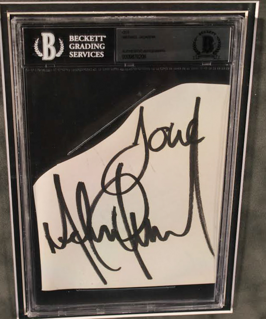 Michael Jackson Signed 27x33 Custom Framed Cut Display Inscribed "Love" (Beckett Encapsulated) at PristineAuction.com Michael Jackson Signed 27x33 Custom Framed Cut Display Inscribed "Love" (Beckett Encapsulated) at PristineAuction.com
