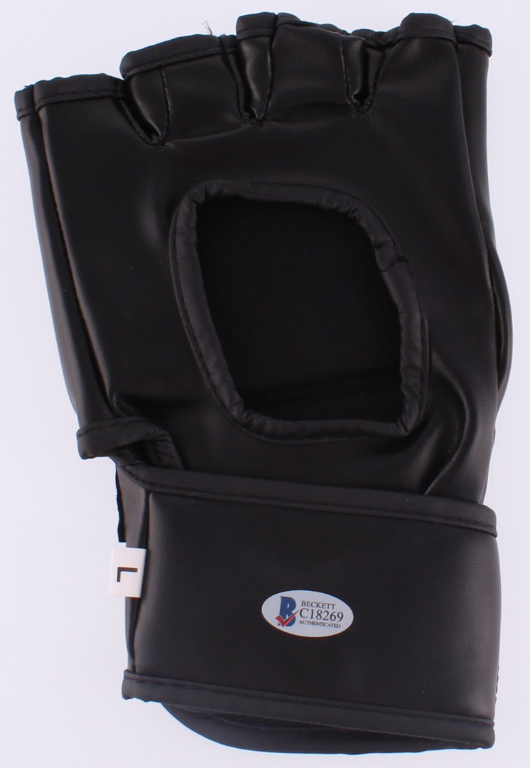 Floyd Mayweather Jr. & Conor McGregor Signed Authentic UFC Glove (Beckett COA & JSA ALOA) at PristineAuction.com Floyd Mayweather Jr. & Conor McGregor Signed Authentic UFC Glove (Beckett COA & JSA ALOA) at PristineAuction.com