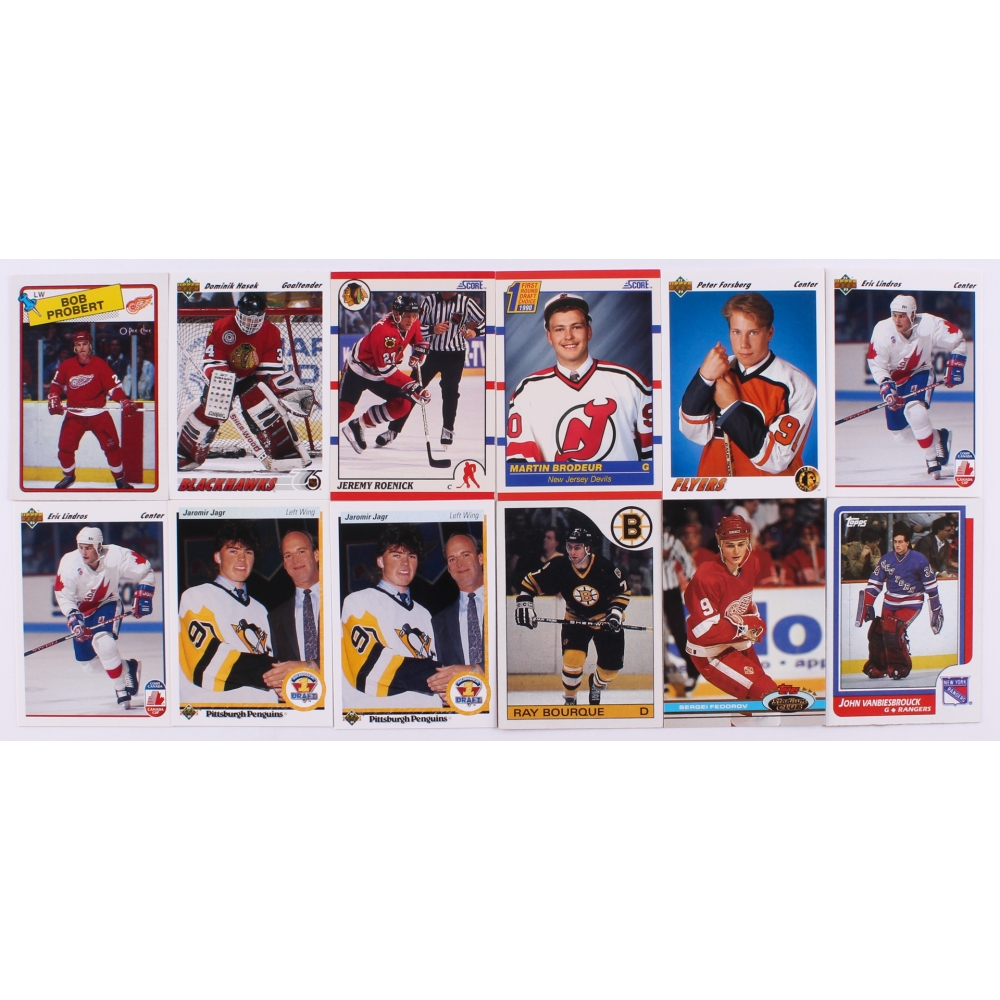 Lot of (12) Assorted Hockey Cards With 1991-92 Upper Deck #9 Eric Lindros  Captain, 1985-86 Topps #40 Ray Bourque, 1990-91 Upper Deck #356 Jaromir  Jagr RC, 1990-91 Score #179 Jeremy Roenick RC | Pristine Auction