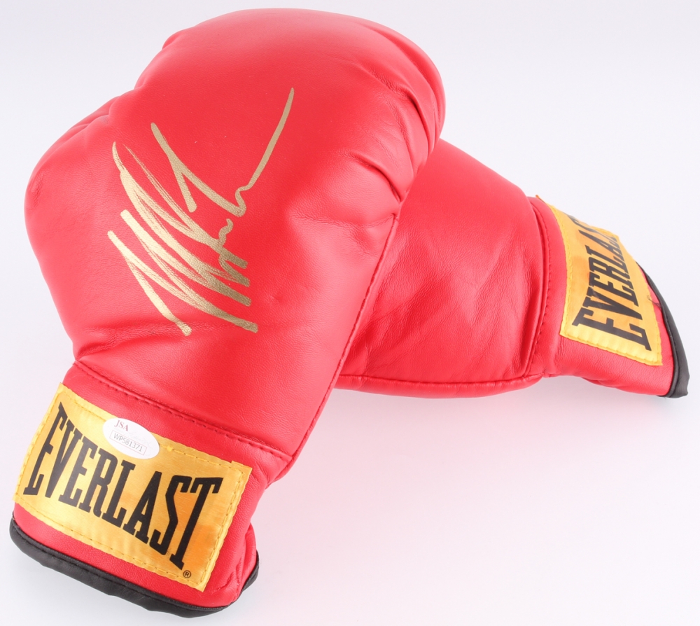Mike Tyson Signed Everlast Boxing Glove (JSA COA) Pristine Auction Mike Tyson Signed Everlast Boxing Glove (JSA COA) Pristine Auction