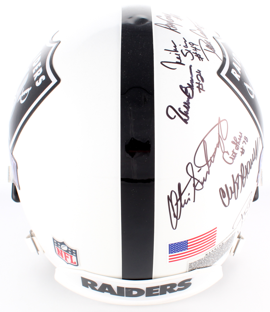 1976 Oakland Raiders Full-Size Authentic Super Bowl Logo Helmet Team-Signed by (11) with Ted Hendricks, Charlie Phillips, Tom Flores, Ray Guy (JSA COA) at PristineAuction.com 1976 Oakland Raiders Full-Size Authentic Super Bowl Logo Helmet Team-Signed by (11) with Ted Hendricks, Charlie Phillips, Tom Flores, Ray Guy (JSA COA) at PristineAuction.com