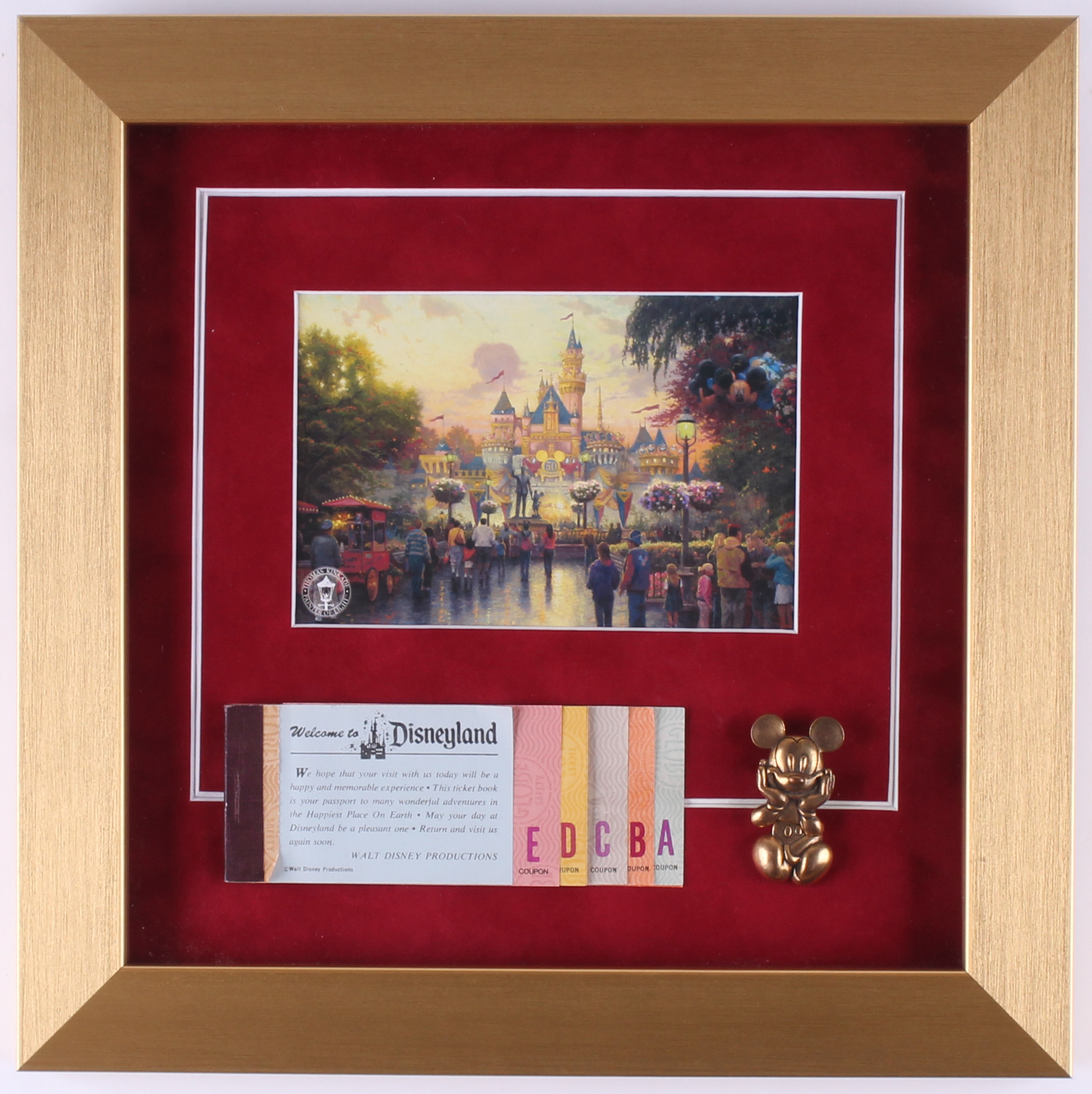 Thomas Kinkade Disneyland "Disneyland's 50th Anniversary" 12x12 Custom Framed Print Display WIth Coupon Book & Brass Pin at PristineAuction.com Thomas Kinkade Disneyland "Disneyland's 50th Anniversary" 12x12 Custom Framed Print Display WIth Coupon Book & Brass Pin at PristineAuction.com