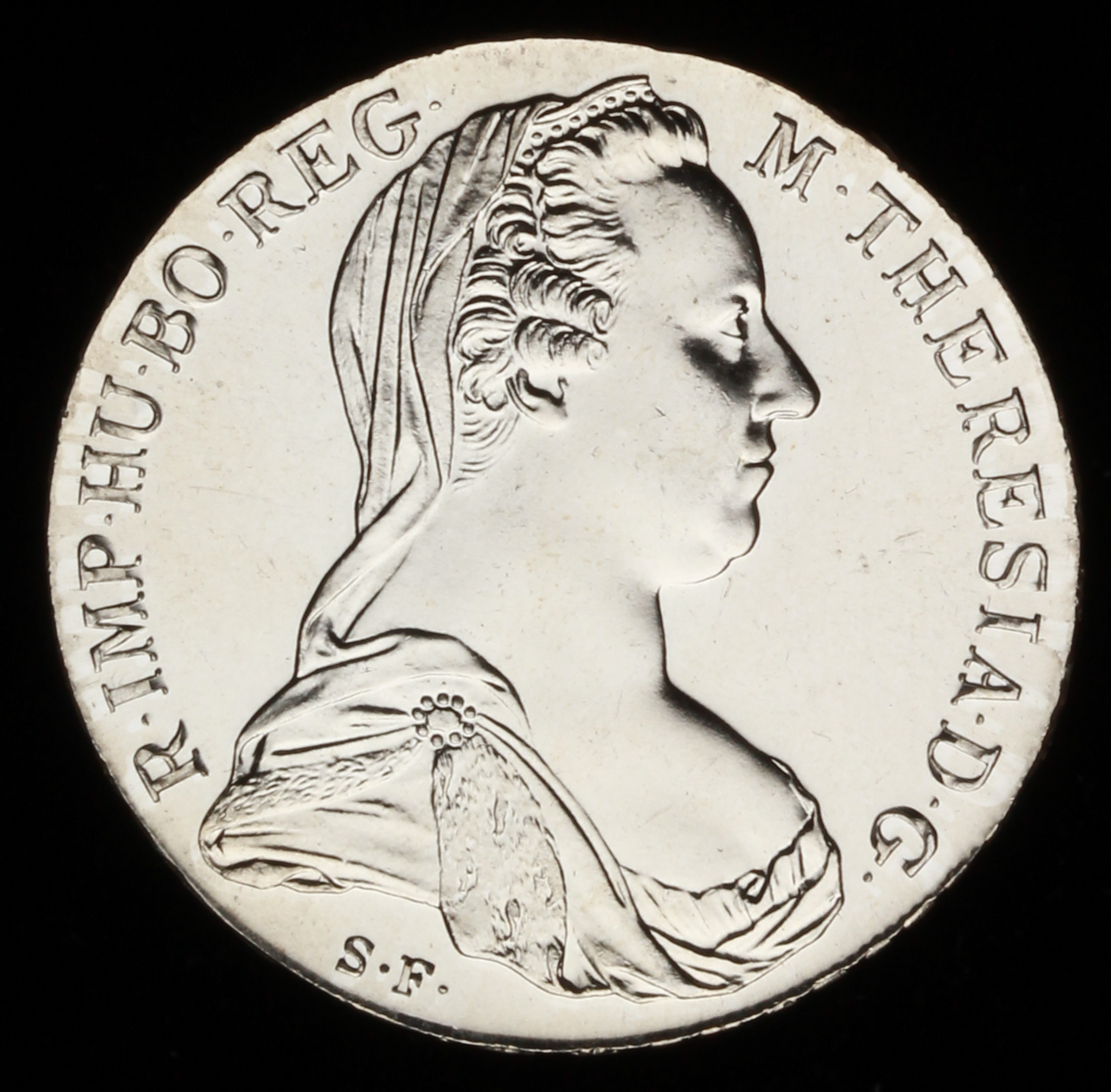 1780 S.F. Maria Theresa Thaler Silver Trade Coin (Re-Strike) GEM Uncirculated at PristineAuction.com 1780 S.F. Maria Theresa Thaler Silver Trade Coin (Re-Strike) GEM Uncirculated at PristineAuction.com
