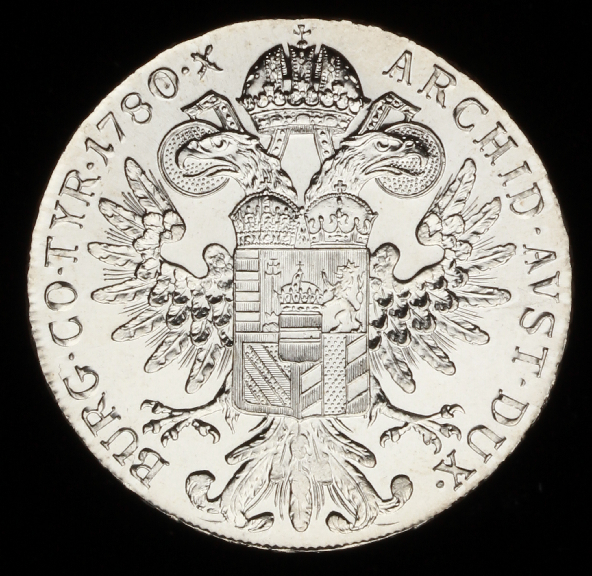 1780 S.F. Maria Theresa Thaler Silver Trade Coin (Re-Strike) GEM Uncirculated at PristineAuction.com 1780 S.F. Maria Theresa Thaler Silver Trade Coin (Re-Strike) GEM Uncirculated at PristineAuction.com