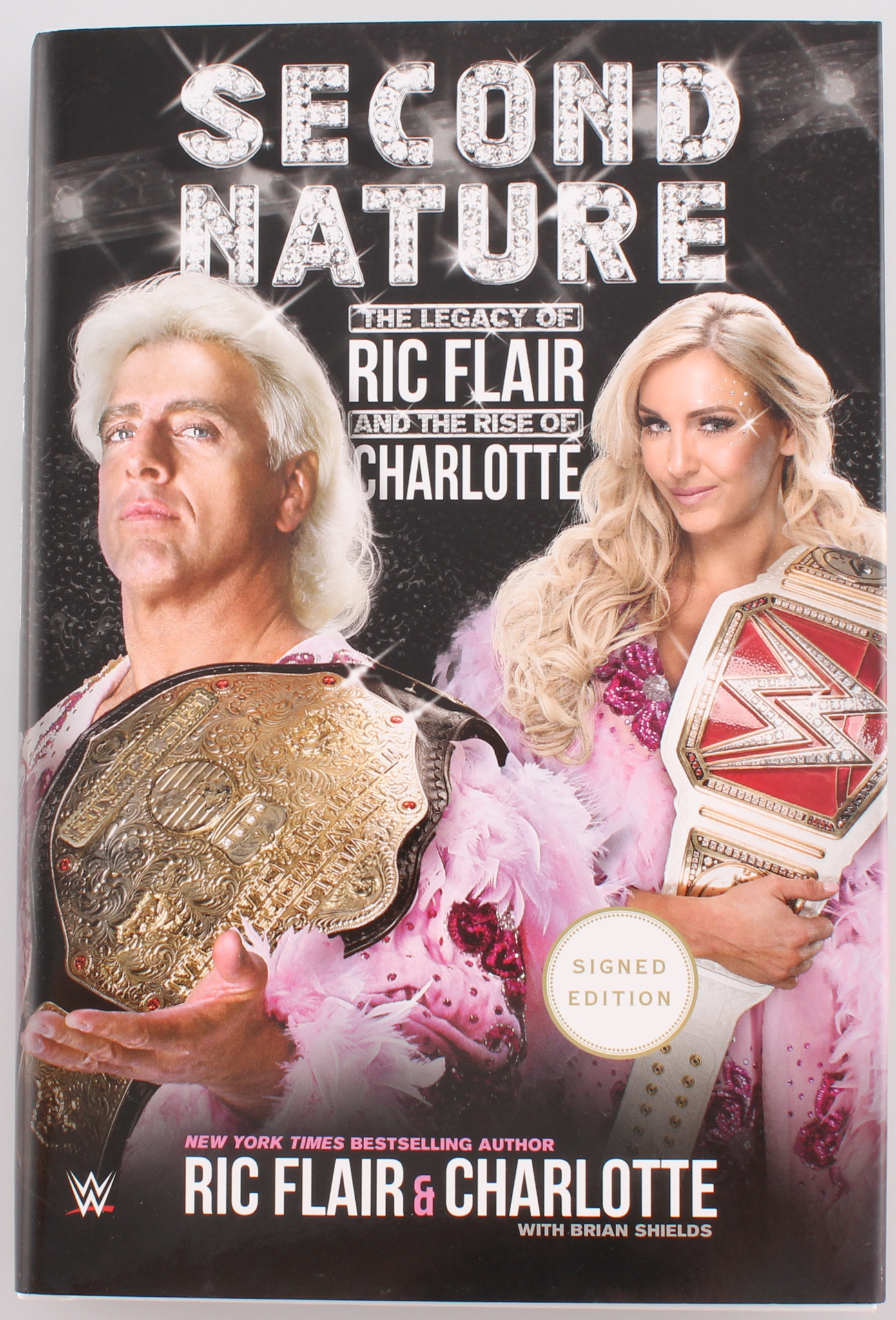 Ric Flair & Charlotte Flair Signed "Second Nature: The Legacy of Ric Flair and the Rise of Charlotte" Hardcover Book (Beckett COA) at PristineAuction.com Ric Flair & Charlotte Flair Signed "Second Nature: The Legacy of Ric Flair and the Rise of Charlotte" Hardcover Book (Beckett COA) at PristineAuction.com